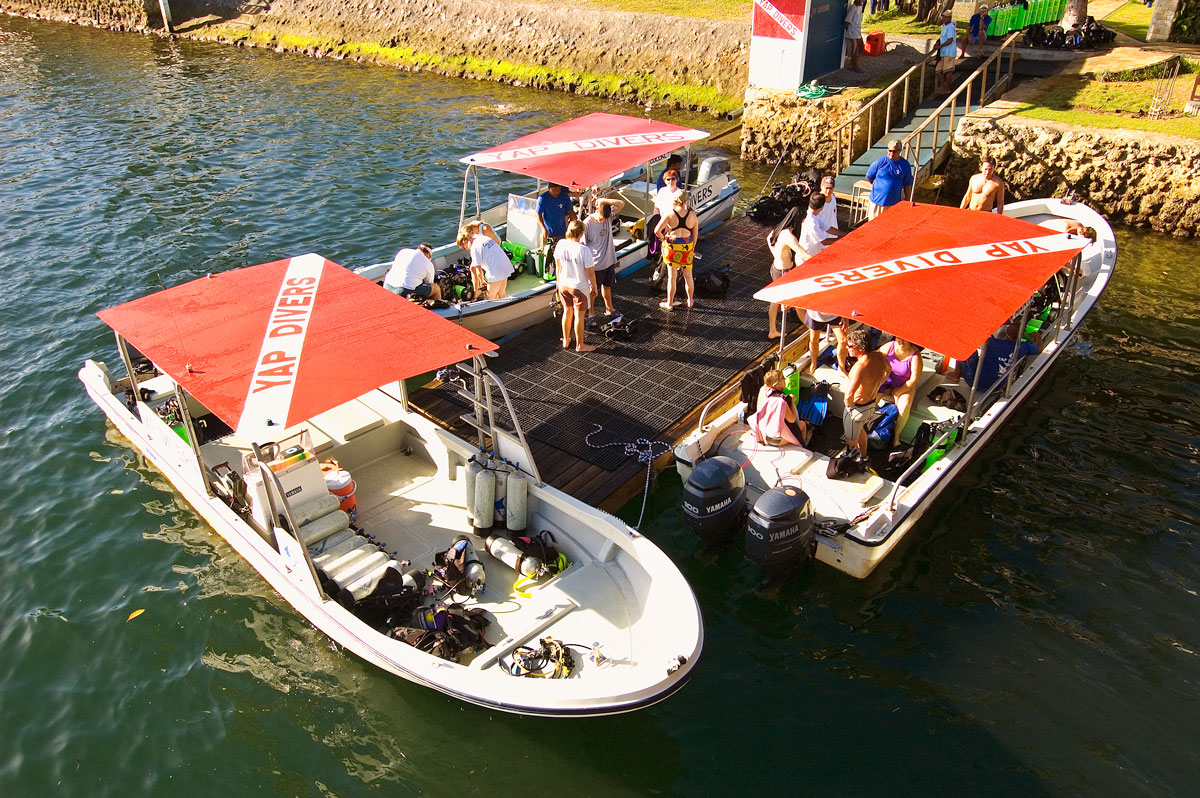 Manta Ray Bay Resort Dock with Dive Boats and Divers